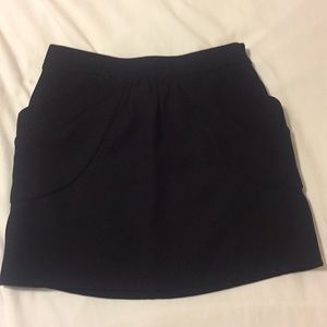 It has pockets! J.Crew black mini sz 2